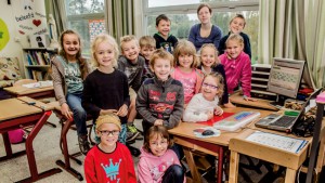 M-decreet: groepsfoto van kinderen in klaslokaal