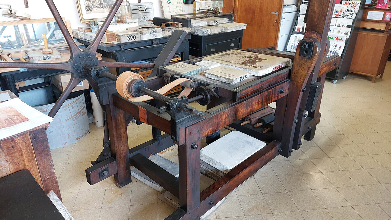 Oude drukpers in Maison de l'Imprimerie