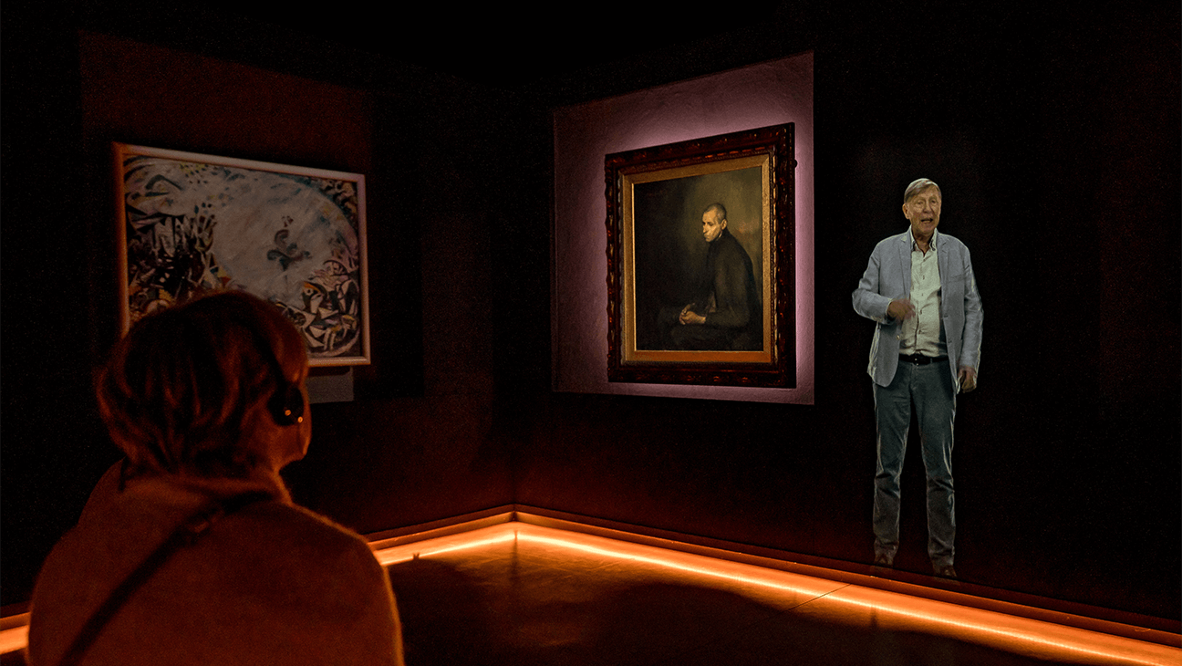Bezoekers kijken naar een schilderij in het kunstuur in Mechelen