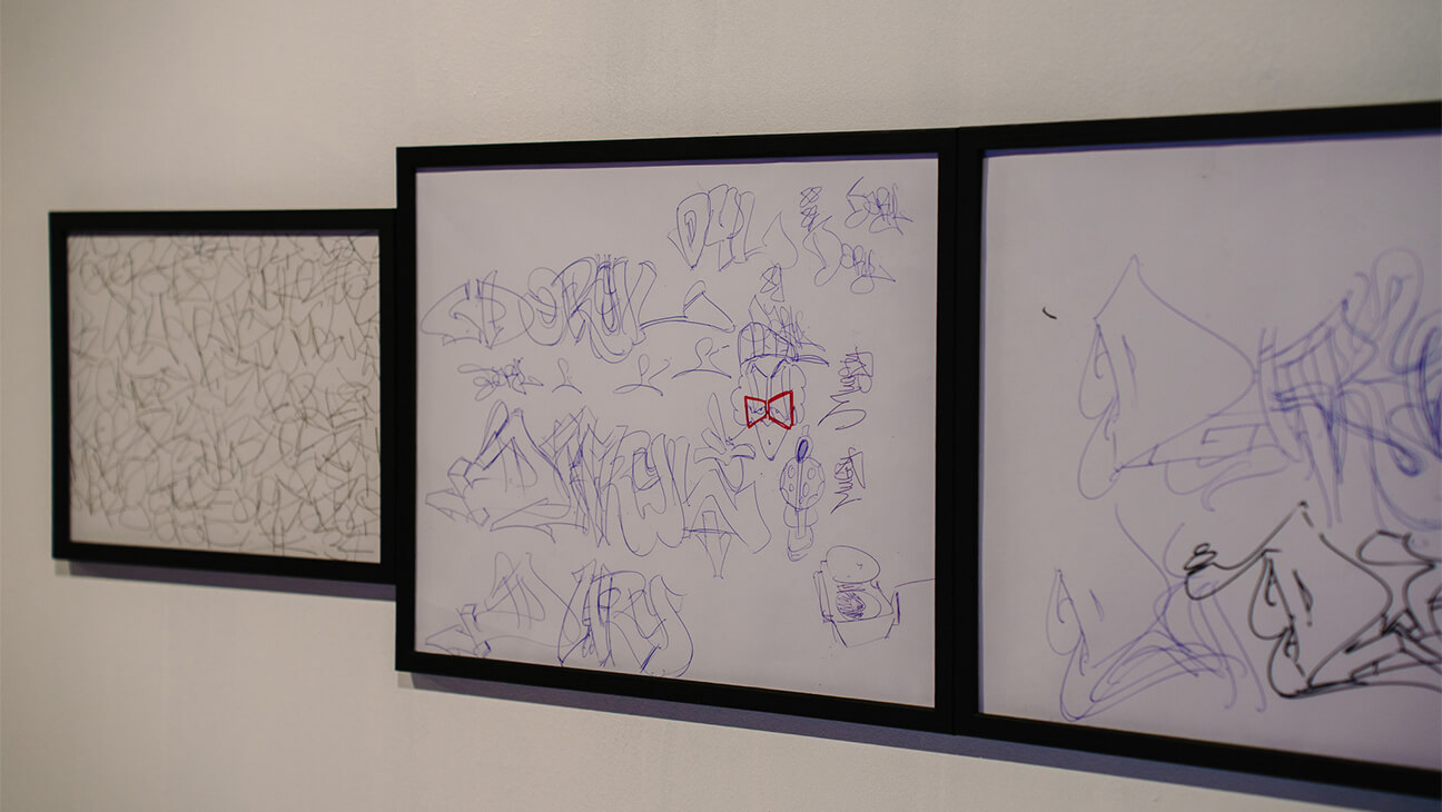 Ingekaderde tekeningen op de Expo 'Subway Art'