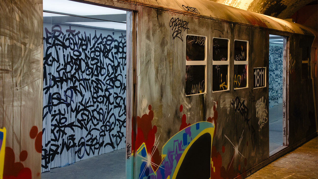 Graffiti op een oud metrostel op de Expo 'Subway Art'