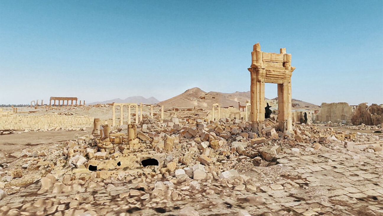 Foto van een vlakte met enkel ruïnes in Syrië